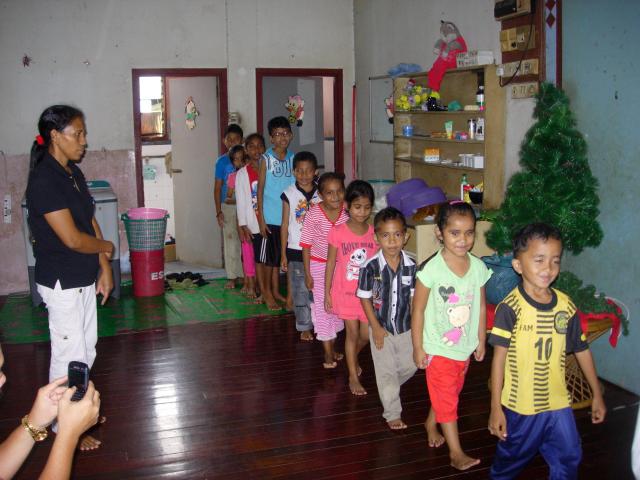Students at the "school" line up