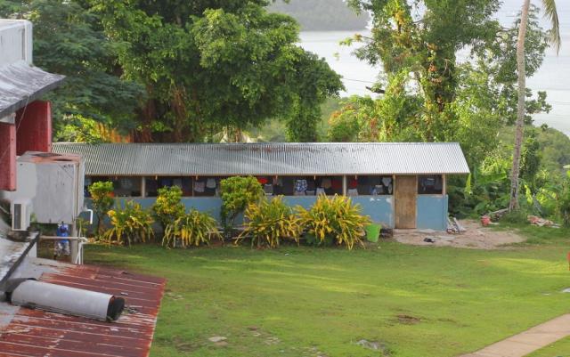 The boy’s shower house in October, rebuilt.