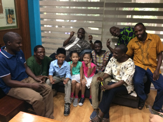 African Jesuits in AIR with the children singers