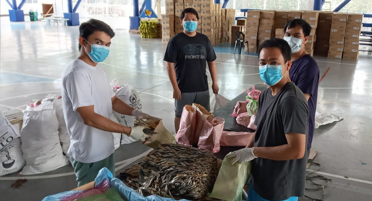 God in the midst of boxes and dried fish